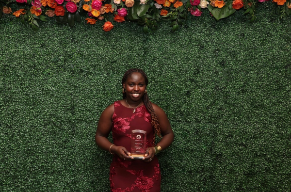 Gloria Lodiong accepting Suffolk's Student Government Association's Senior of the Year award. Courtesy of Gloria Lodiong.