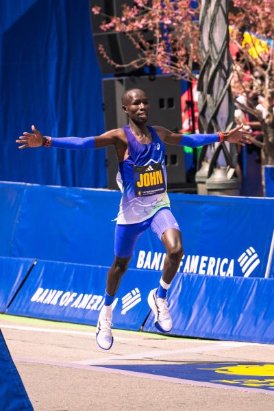 2026 Boston Marathon men's champion John Korir set a new course record while defending his 2025 title.